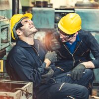 Senior male worker accident in factory.Maintenance worker in the control room of factory.Safety first concpet.