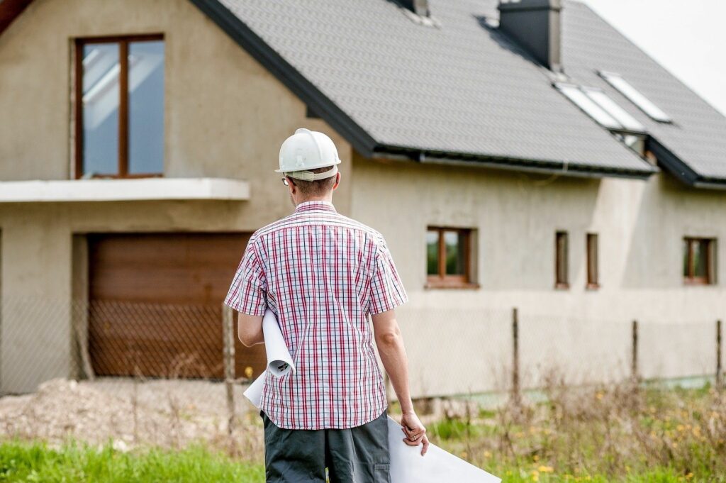 Contractor walking towards house