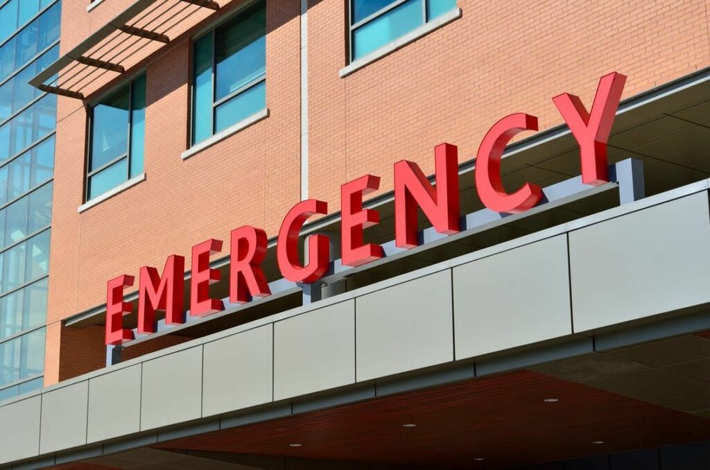 The front sign of an emergency room at a hospital. 