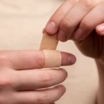 wrapping finger with band-aid
