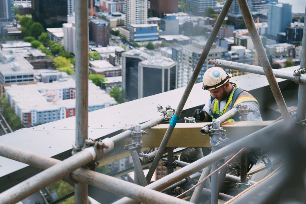 Workers on a High Rise