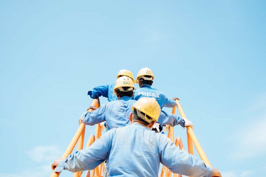 Workers Climbing Steps