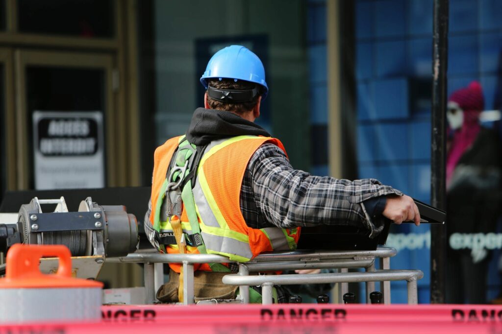 Man wearing a blue hardhat 