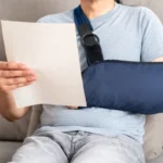 Reading letter about Injury and compensation paperwork, insurance, legal contract or lawyer consulting.Disability people, attorney or advocate in negotiation,policy advice or accident report closeup